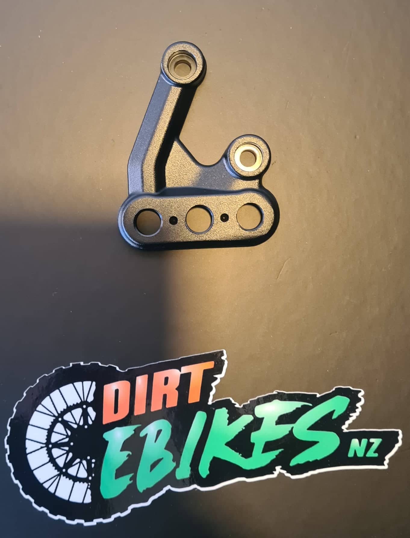 Sur-Ron foot peg mounts - left and right